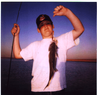 Ryan with one of the many white bass caught on our latest trip to Ray Bob